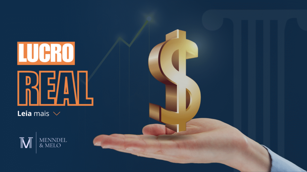 Uma mão segurando um $ dourado, com o texto ao lado "Lucro Real"